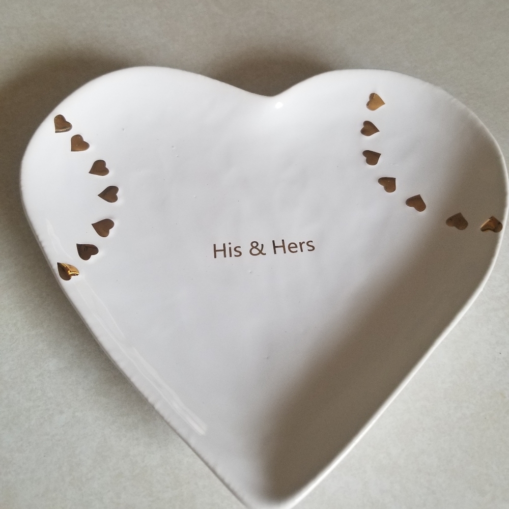 Heart shaped his and hers dresser catch.